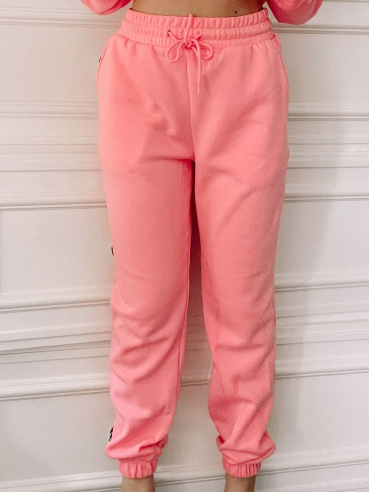 Bright + Toasty Fleece Hot Pink Joggers | Sassy Shortcake | sassyshortcake.com Sporty Pink Sweatpants With Ribbed Waistband, Pink Sweatpants With Ribbed Waistband, Sporty Pink Bottoms With Ribbed Cuffs, Casual Pink Sweatpants For Jogging, Pink Relaxed Fit Joggers For Athleisure, Pink Fleece Sweatpants For Loungewear, Pink Cotton Sweatpants For Leisure, Pink Sweatpants With Pockets For Jogging, Pink Cotton Sporty Sweatpants