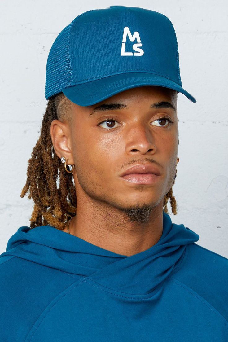 Expertly designed for maximum ventilation and style, our classic trucker hat is the perfect accessory to elevate any look. Body: 100% Cotton Mesh: 100% Dacron Blue Snapback Dad Hat For Streetwear, Blue Flat Bill Dad Hat For Streetwear, Trucker Baseball Cap With Curved Visor, Casual Mesh Trucker Hat With Curved Visor, Blue Mesh Casual Hat, Casual Blue Mesh Hat, Blue Dad Hat For Streetwear, Blue Sporty Dad Hat With Curved Bill, Blue Trucker Baseball Cap For Streetwear