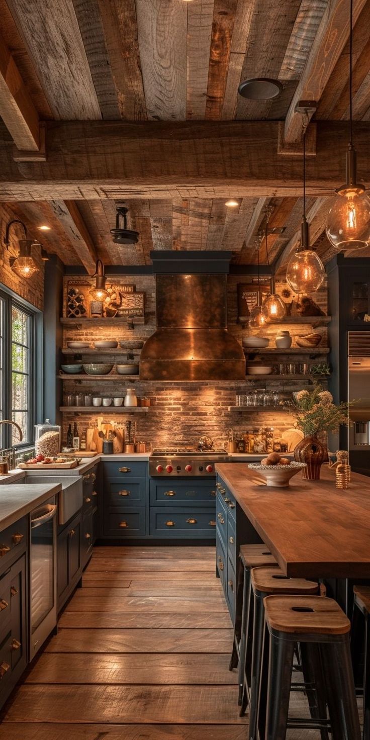 a kitchen with wooden floors and blue cabinets