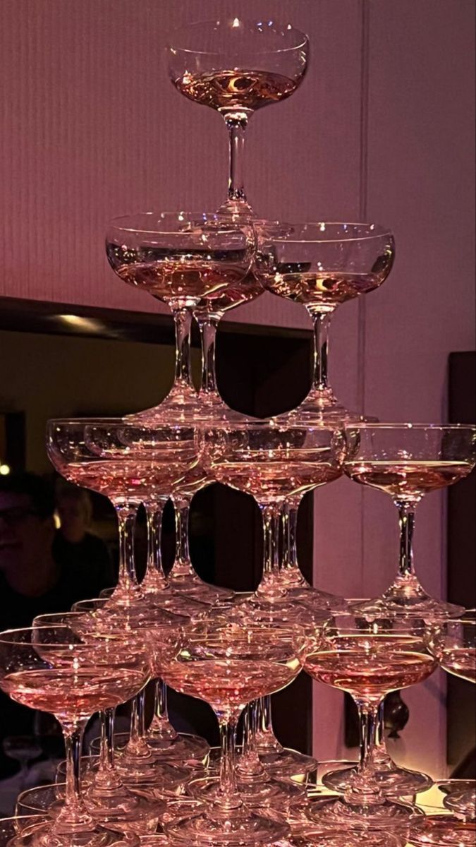 several wine glasses stacked on top of each other