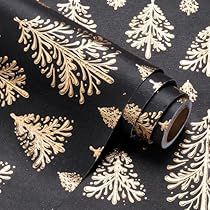 a black and gold christmas wrapping paper with golden pine trees on it's side