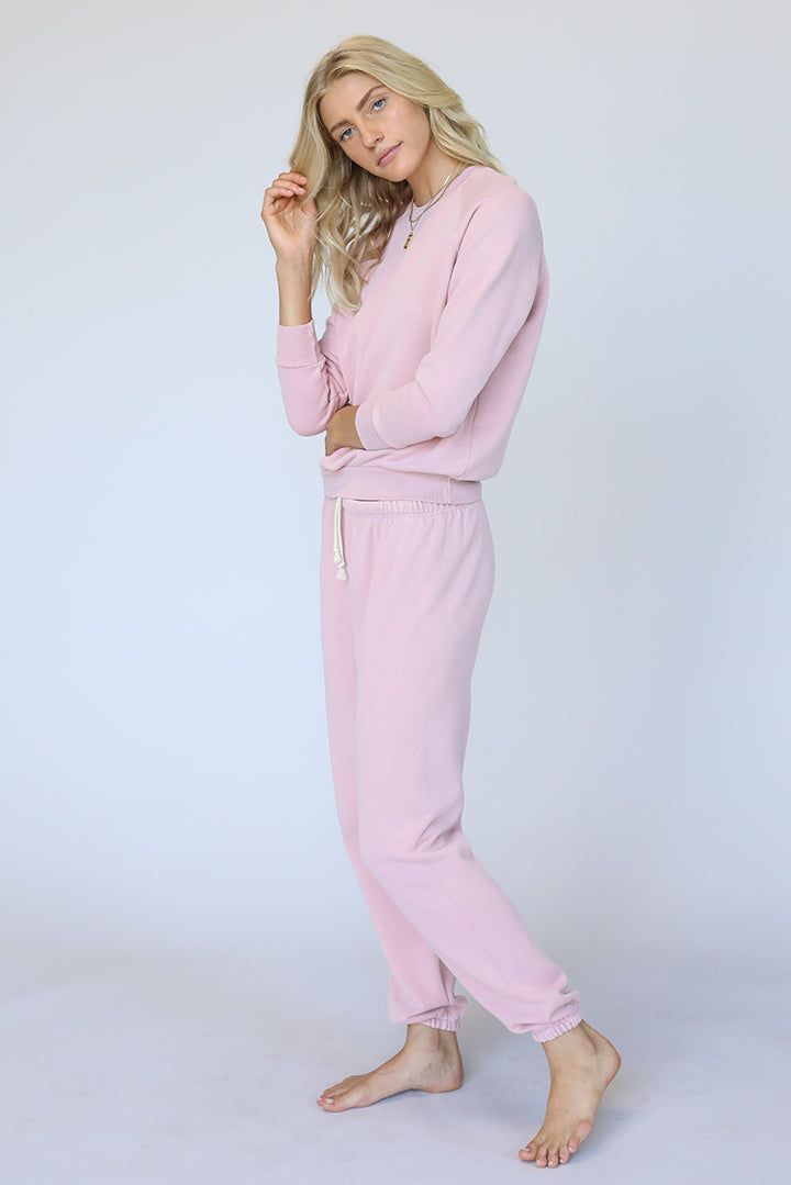 you asked for an easy fit jogger and this is it. a little high waisted with a simple hidden drawcord. designed to lounge in, play in, and work in. you never take these off. ever. perfectly paired with our Heart hoodie. elevated loungewear that's forever your favorite. 100% cotton fleece machine wash cold with like colors. tumble dry low. mindfully made in los angeles, california. we garment dye our collection, so there may be slight variances with shading and color. when purchasing a set, we rec Comfy Sweats With Drawstring Hood For Leisure, Relaxed Fit Sweats With Drawstring Hood For Lounging, Comfy Leisure Activewear With Drawstring, Solid Color Drawstring Sweatpants For Loungewear, Comfortable Sweats With Drawstring Hood For Lounging, Comfortable Loungewear Activewear With Drawstring, Cozy Sweats With Elastic Cuffs For Lounging, Solid Color Drawstring Sweatpants For Lounging, Sporty Tracksuit With Elastic Waistband For Loungewear