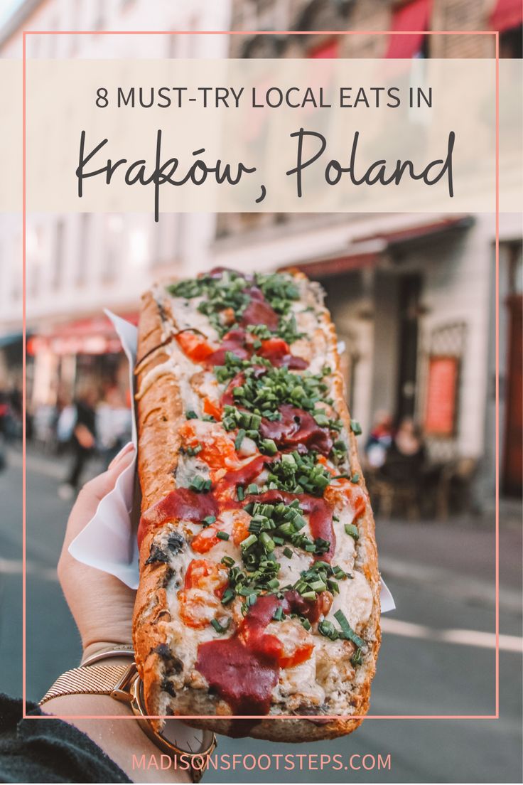 a person holding up a long sandwich with toppings on it and the words 8 must - try local eats in prague, poland