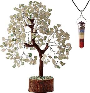 a small tree is next to a necklace