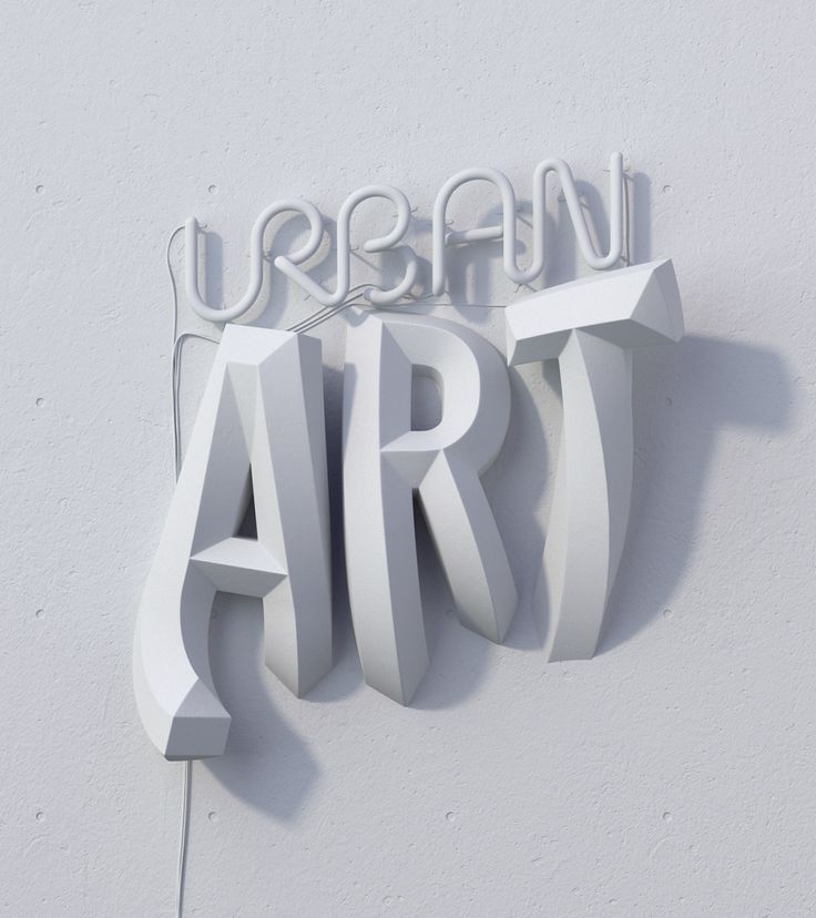 the word urban art is made out of white plastic letters on a wall in front of a gray background