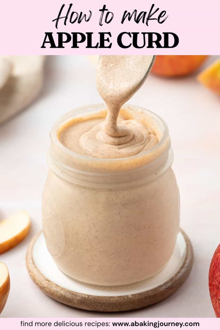 an apple butter is being poured into a jar