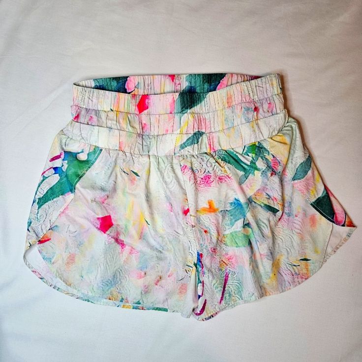 New Without Tags Watercolor Colors Playful White Beach Bottoms, Athleisure Shorts For Spring Vacation, Playful White Shorts For Beach Season, Playful Summer Workout Shorts, Playful Workout Shorts For Summer, White Athleisure Shorts For Spring, Playful White Shorts For Vacation, White Nylon Bottoms With Elastic Waistband, Beach Athleisure Shorts For Spring