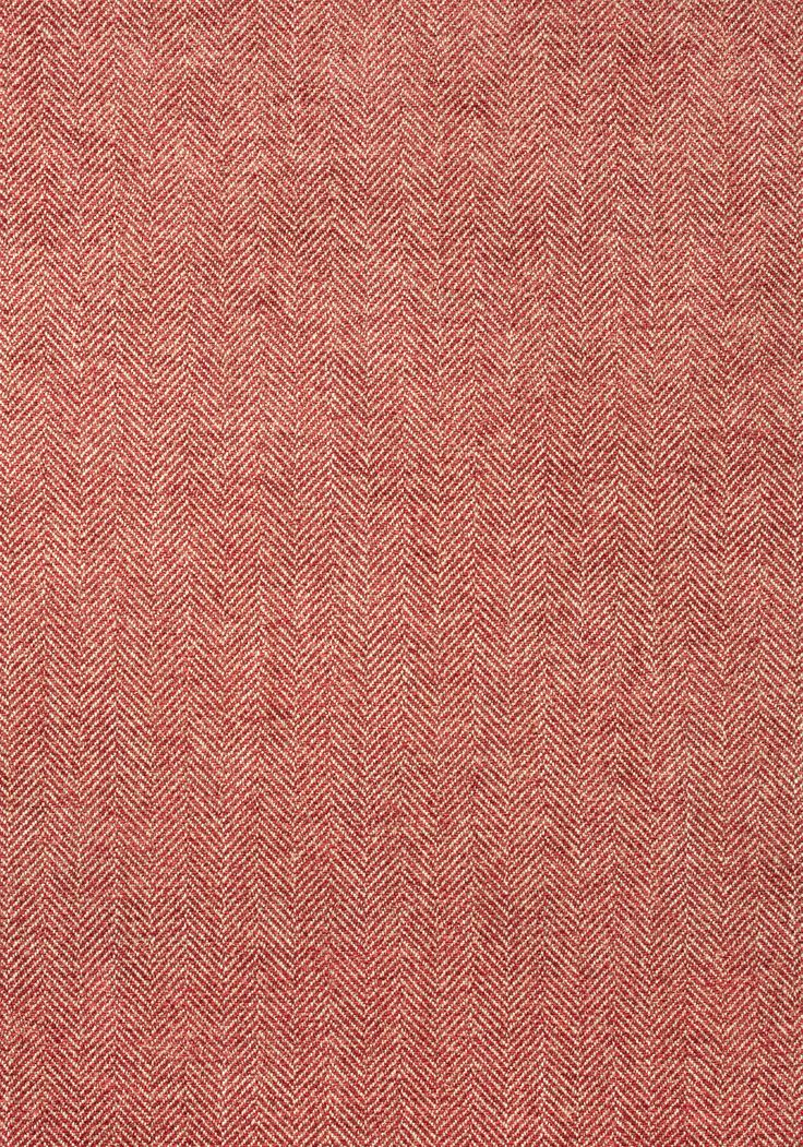 a red and white fabric textured with herringbones