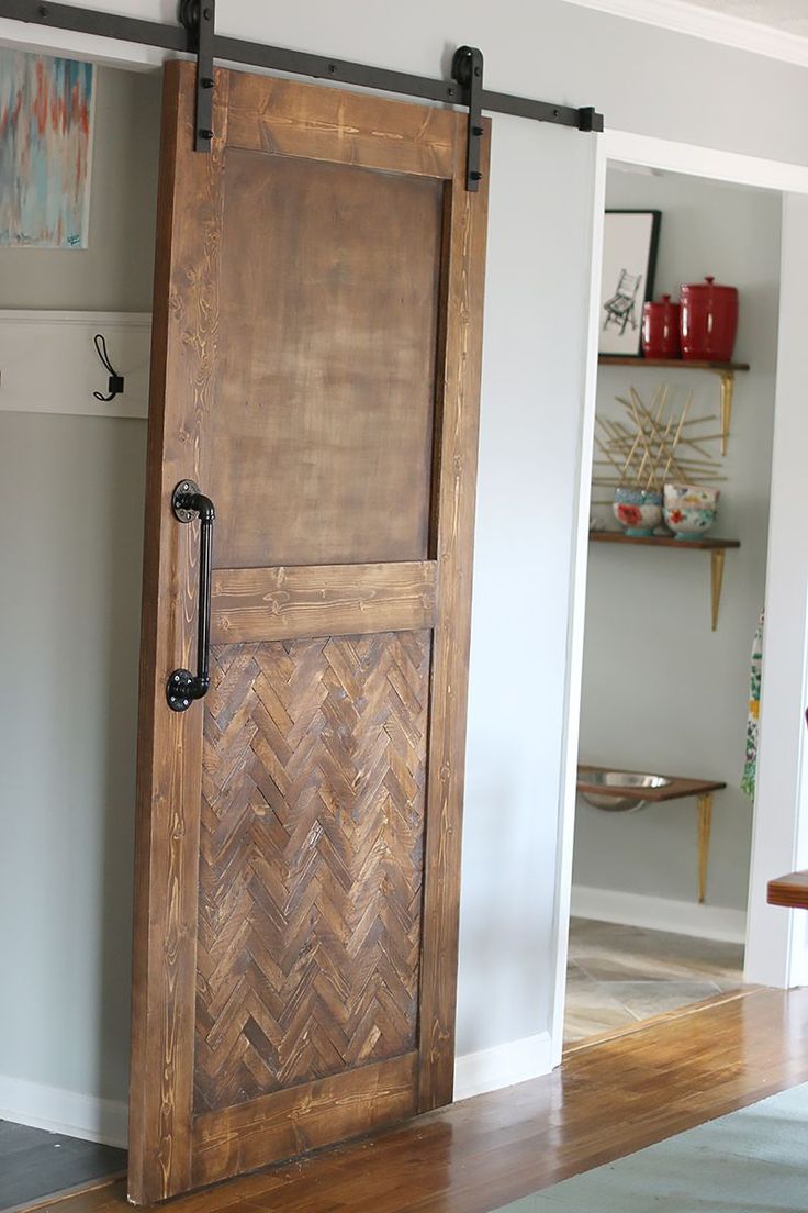 an open wooden door in a living room