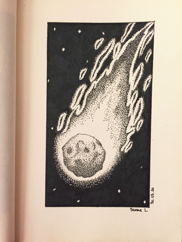 an open book with black and white drawings on the pages, including a drawing of a comet