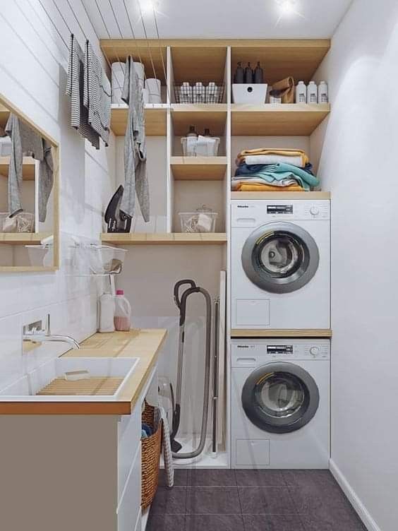 a washer and dryer in a small room