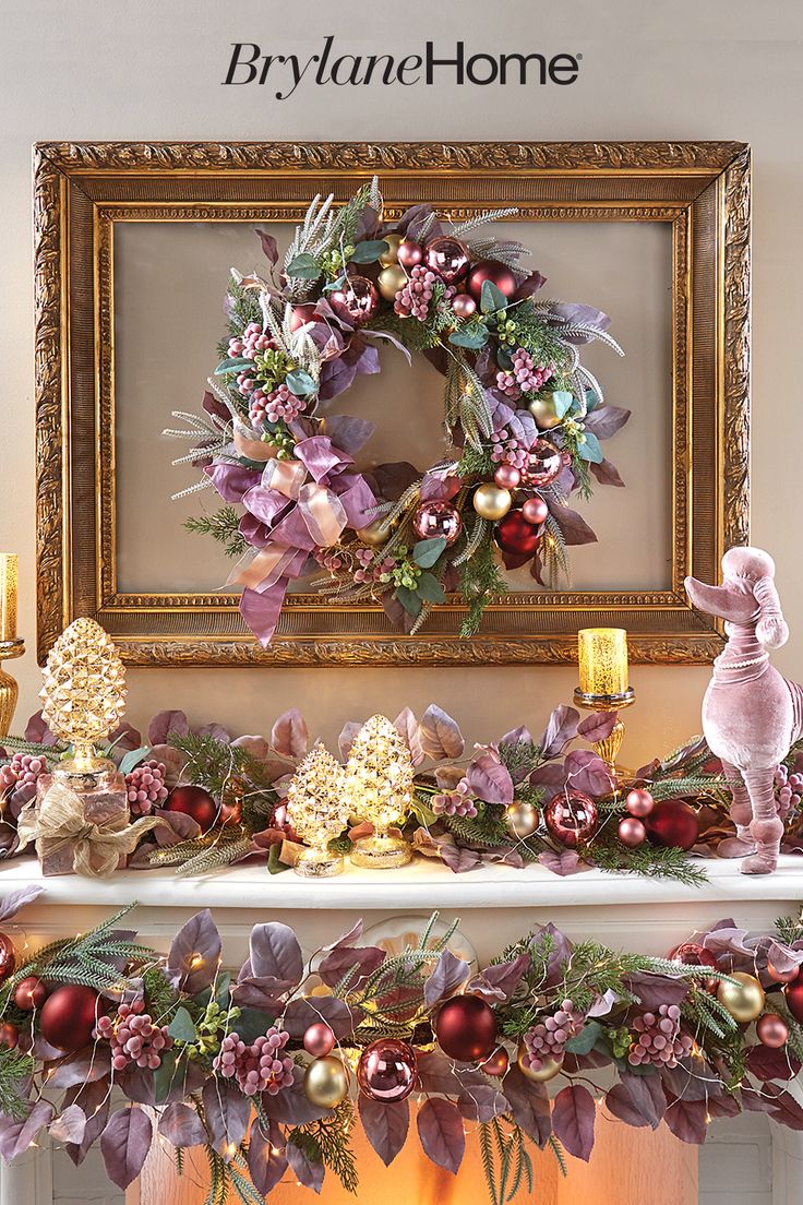 a mantel decorated with christmas decorations and wreaths