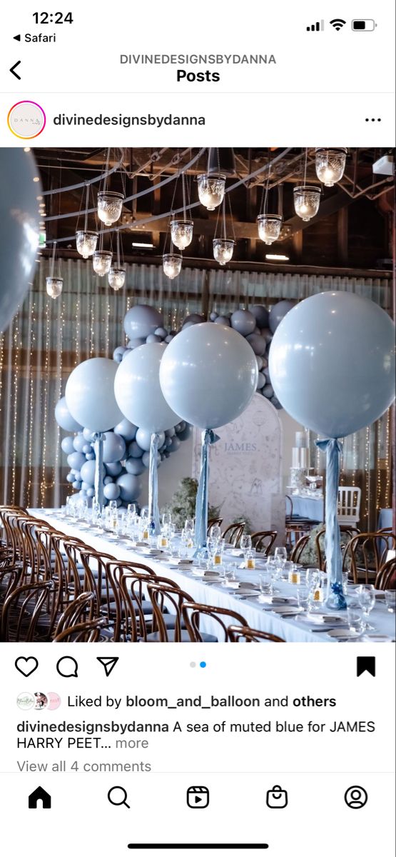 an instagramted photo of balloons and tables at a party with white tablecloths