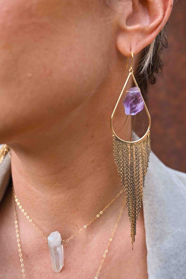 Our most popular crystal fringe statement earrings now come with Amethyst crystals. These unique tassel earrings look stunning when the light dances off of them! They are the perfect bridal or bridesmaids earrings or would make a great gift for yourself or a girlfriend. Amethyst is a stone of intuition, connecting you to your inner wisdom, empowering you to trust yourself! Amethyst crystals *color of purple amethyst is lighter purple and ranges in lightness Gold fringe earrings Weight: .22 oz Dr Crystal Fringe, Framed Jewelry, Bridesmaids Earrings, Gold Fringe, Amethyst Crystals, Bar Jewelry, Inner Wisdom, Raw Amethyst, Mala Necklace