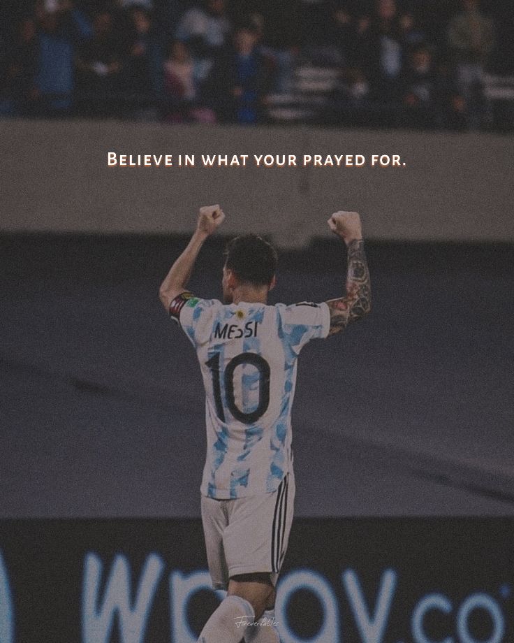 a soccer player with his arms in the air and saying, believe in what your prayer for