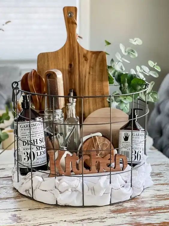 a basket filled with kitchen items on top of a wooden table