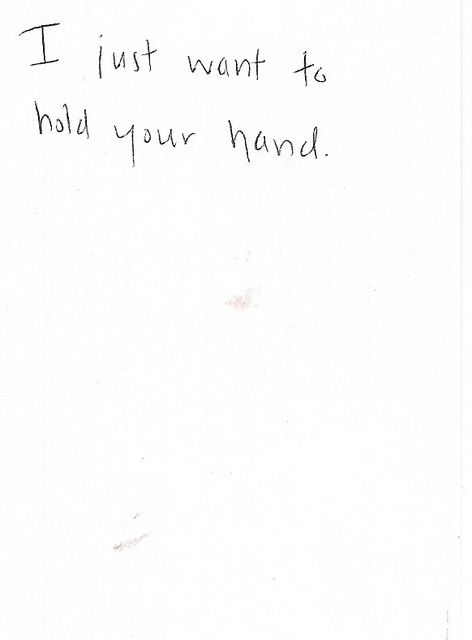 a handwritten note with the words i just want to hold your hand