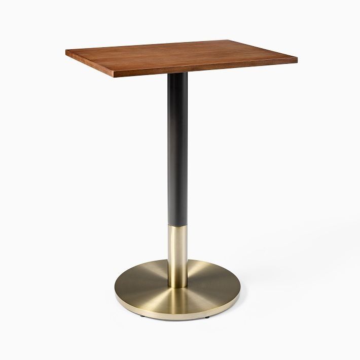 a square wooden table with a metal base and a wood top on a white background