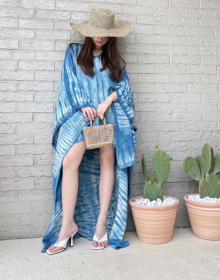 Walk down sunny cobbled streets sporting the Handmade Nano Straw Bag. This straw bag exudes sophistication, beautifully paired with double handles. Complete with a spacious compartment, this statement bag is a must-have! This straw bag is a stylish addition to pair with your favorite sundress. Features: Handcrafted Natural straw Environmentally friendly Lightweight Double handles Size (approximate): H 5” L7 ” W 2” **DISCLAIMER** Please understand that all products of Coco de Chom are handmade on Large Capacity Beach Bag For Summer Day Out, Blue Woven Straw Bag For Spring, Spring Beach Bag With Large Capacity For Day Out, Large Capacity Beach Bag For Spring Day Out, Spring Vacation Beach Bag, Blue Straw Bag For Spring Beach Outings, Blue Beach Bag For Spring, Blue Summer Beach Bag For Spring, Summer Beach Bag For Day Out, Rectangular