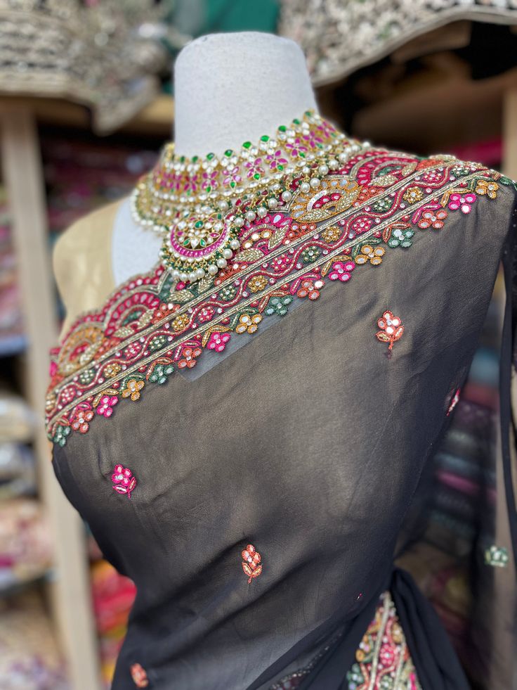 Traditional Embellished Pre-draped Saree In Chinon, Multicolor Georgette Blouse For Reception, Traditional Embellished Pre-draped Georgette Saree, Multicolor Blouse With Dupatta For Reception, Black Blouse With Dupatta For Reception, Traditional Embellished Georgette Blouse, Anarkali Style Embellished Georgette Blouse, Traditional Embellished Blouse Piece With Drape, Black Embellished Blouse With Traditional Drape