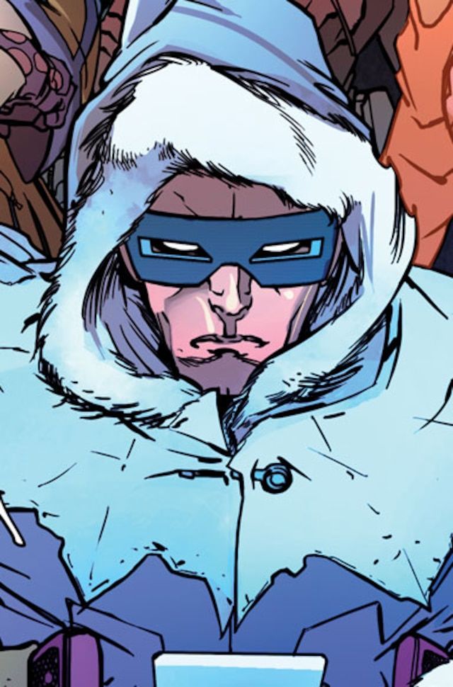 an image of a man in winter clothes with snow on his face and hood over his eyes