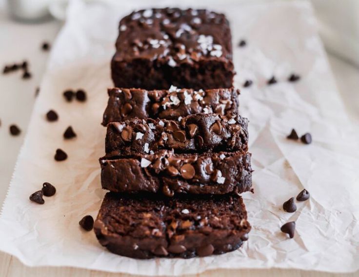 three chocolate brownies stacked on top of each other