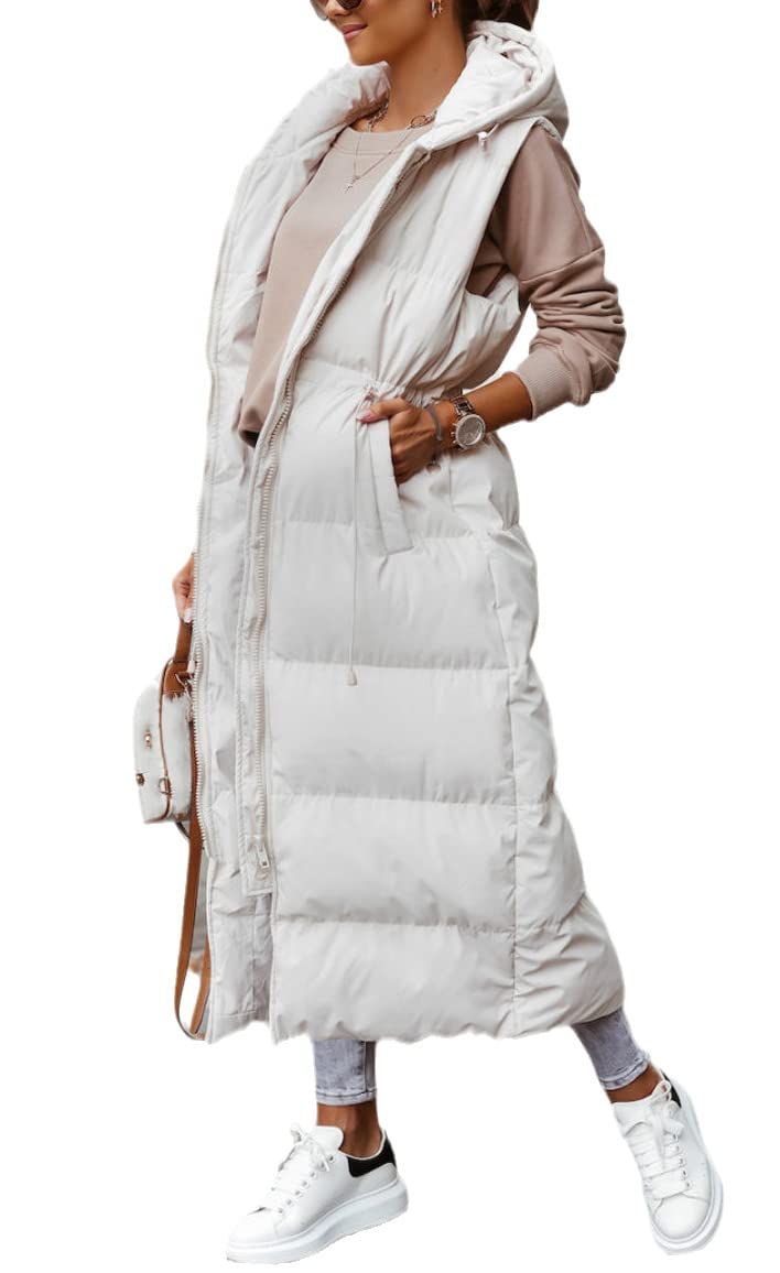 PRICES MAY VARY. Material: Shell/Lining Fabric: 100% polyester. Filling soft down-alternative, makes this puffer vest comfortable and keep you warm. Feature: Long quilted vest, windproof shell and warm padded inside, easy full zipper up and down, 2 hand pockets and 1 inside pocket for storage convenience, with hood, adjustable waist drawstring. Trendy and heavy, stylish and puffy, cozy and warm with good quality, this long vest would be a great layering piece to add to your winter wardrore! Matc Long Quilted Vest, Corduroy Shirt Dress, Long Quilted Coat, Sleeveless Puffer, Snow Wear, Winter Outerwear, Long Vests, Coat Winter, Comfortable Room