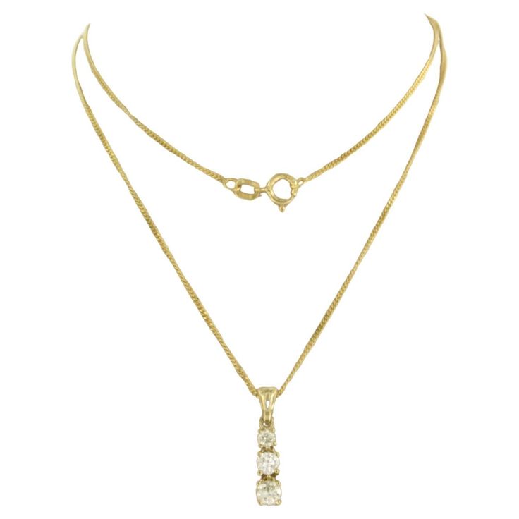 14k yellow gold necklace with pendant set with brilliant cut diamonds up to . 0.40 carat J/K VS/SI - 45 cm detailed description: the length of the necklace is 45 cm long by 0.7 mm wide the size of the pendant is 1.9 cm by 5.0 mm wide Total weight 2.9 grams set with - 3 x 2.6 mm - 3.6 mm brilliant cut diamond, up to. approximately 0.40 carats color J/K purity VS/SI necklace and pendant are in good condition hallmark present, guaranteed 14k gold Handling: If you are the highest bidder, you will re Gold Necklace With Pendant, 14k Yellow Gold Necklace, Antique Pendant, Vintage Necklaces, Gold Ring Sets, White Gold Necklaces, Modern Necklaces, Pearl Pendant Necklace, Pendant Set