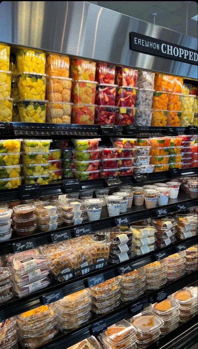 a display in a grocery store filled with lots of food