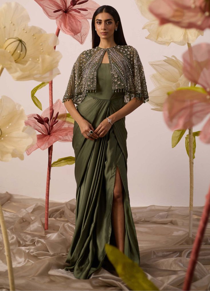 Disa Olive Gown And Cape by Roqa available on Indiaspopup.com Olive Gown, Detachable Cape, Embroidered Cape, Green Drapes, Blue Cape, Clothing Website, Cape Jacket, Dress Crafts, Perfect Wardrobe