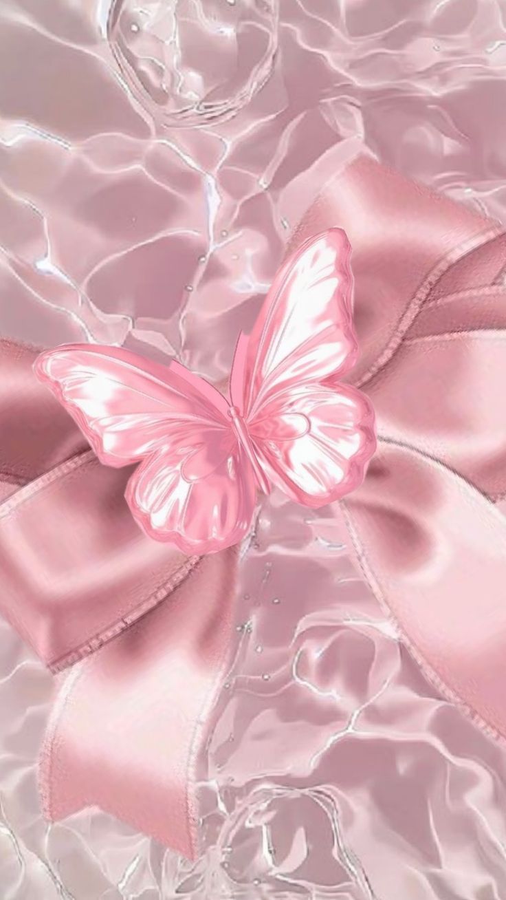 a pink ribbon with a butterfly on it sitting in the water and looking at the camera