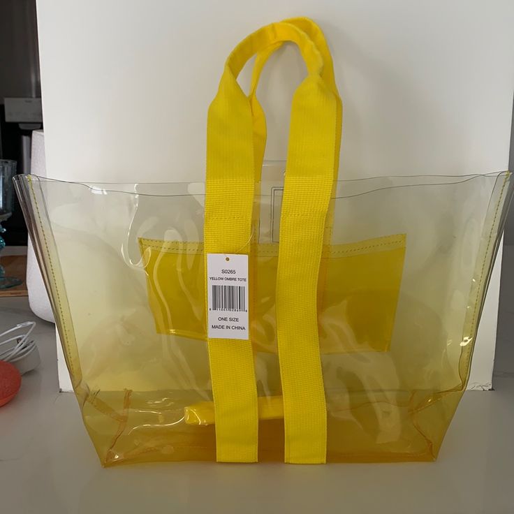 Saks Fifth Ave Ombre Tote. See Through Everyday Summer Bag With Clear Strap, Clear Bags For Daily Use In Spring, Clear Spring Shopping Bag, Spring Clear Shopping Bag, Clear Bags For Spring Shopping, Spring Clear Shopping Bags, Yellow Double Handle Satchel For Summer, Yellow Rectangular Satchel For Summer, Clear Everyday Bags For Summer