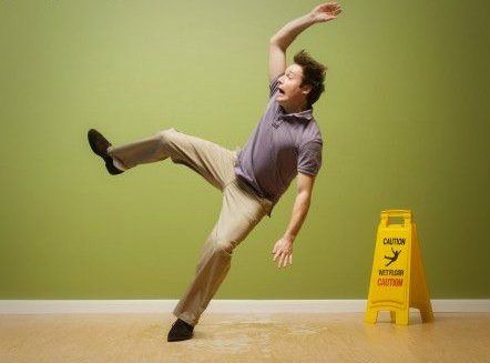 a man is doing an acrobatic move in front of a sign that says how to eliminate the top 2 areas of workplace injuries