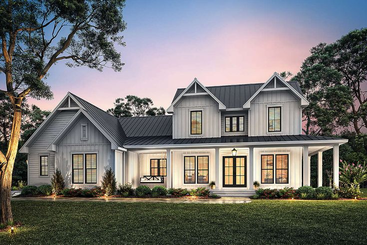 this is an artist's rendering of the front elevation of these farmhouse house plans