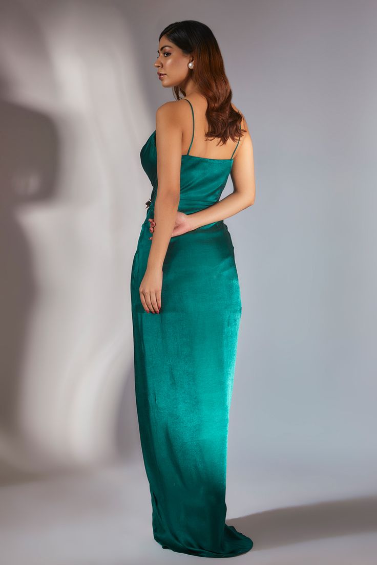 Teal green draped embroidered maxi dress. Paired with a teal green satin organza ombre scarf.
Components: 2
Pattern: Embroidered
Neckline: Sweetheart
Sleeve Type: Sleeveless
Fabric: Gajji Silk
Color: Green
Occasion: Party - Aza Fashions Green Pre-draped Satin Gown, Green Ruched Evening Maxi Dress, Green Satin Chic Maxi Dress, Green Ruched Maxi Dress For Gala, Green Draped Maxi Dress For Gala, Chic Green Draped Evening Dress, Green Draped Prom Dress, Green Silk Maxi Dress For Cocktail, Green Draped Evening Maxi Dress