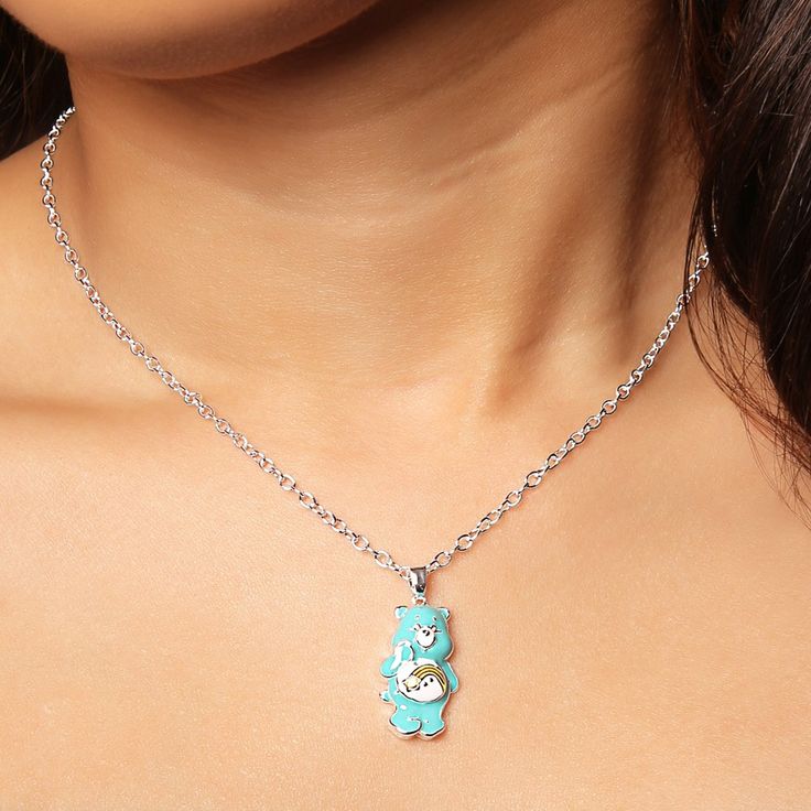 Add a touch of nostalgia to your jewelry collection with the Care Bears Wish Bear 3D Pendant Necklace. This adorable pendant features a detailed 3D design of Wish Bear, crafted with care to capture its iconic charm. Perfect for Care Bears fans and anyone who loves playful accessories. Care Bears Wish Bear, Wish Bear, The Care Bears, 3d Pendant, Pave Necklace, Suede Cord, Care Bears, Gold Dipped, Glass Heart