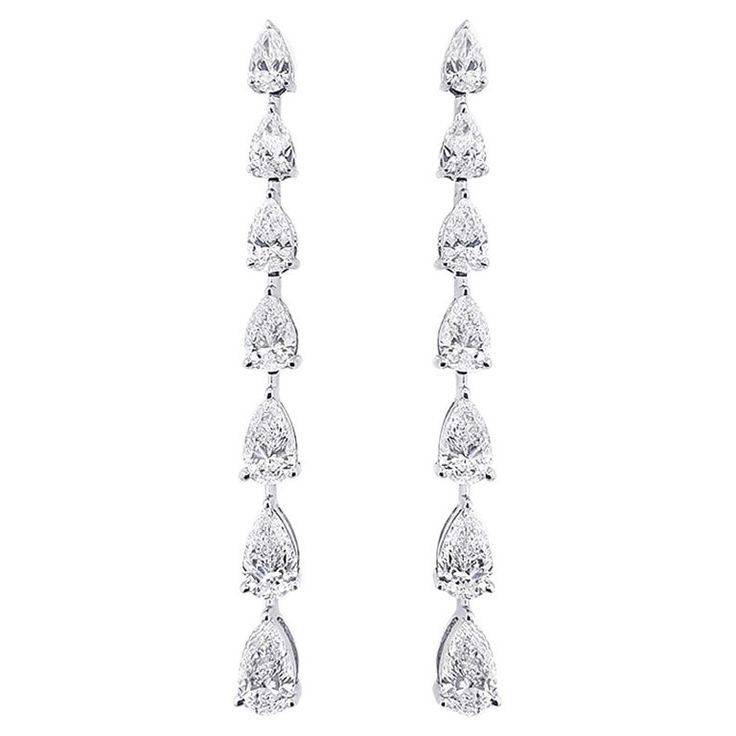 Refreshing your style statement one trend at a time. A scintillating mix of pear cut diamonds set in 14 kt white gold. Gold- 3.31 gms Diamond- 2.52 carats Diamond Colour: G Diamond Clarity: SI Earring Weight: 3.83 gms PLEASE ALLOW 5-10% VARIATION White Pear-shaped Chandelier Earrings, White Gold Diamond Chandelier Earrings Pear-shaped, Luxury White Gold Pear-shaped Chandelier Earrings, Silver Pear-shaped Chandelier Earrings Fine Jewelry, White Pear-shaped Chandelier Earrings Fine Jewelry, Pear Cut Diamond, Pear Cut, Diamond Drops, All That Glitters