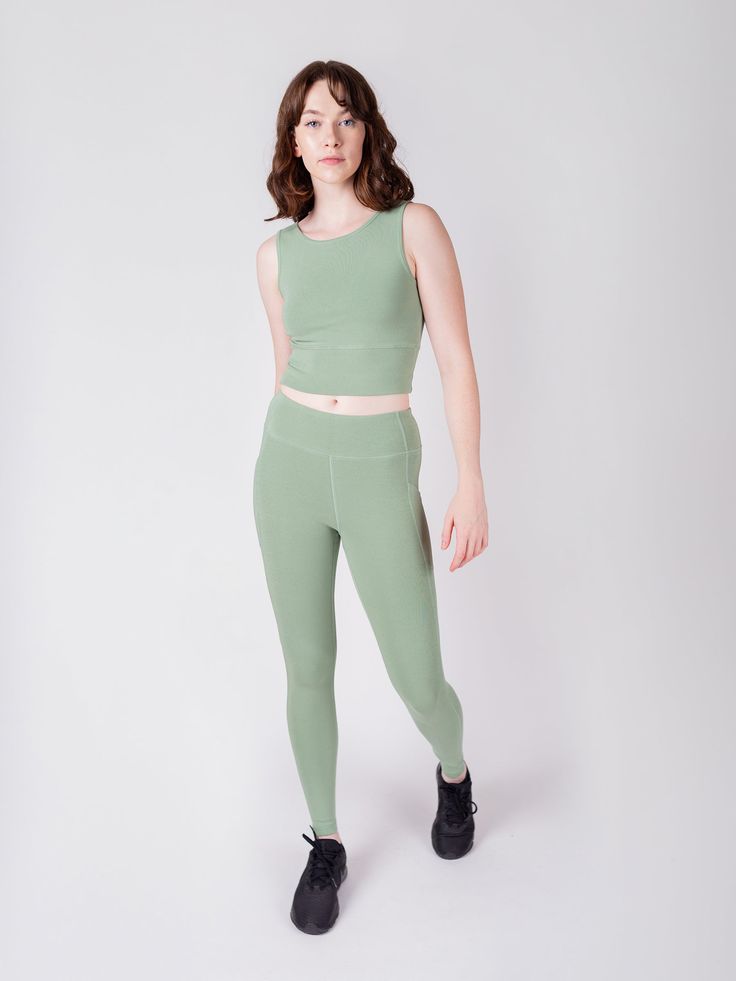 In a world of polyester and nylon, we're breaking the trend with our eco-conscious performance fabric crafted from ribbed organic cotton. In Sage green. Structured support where you want it, stretchy comfort where you need it. You'll seriously want to wear these every day.• Creamy soft feel and sleek fit• 4-way stretch + sweat-wicking• Soft and breathable natural fibers• Low-impact, non-toxic dyes• Stretchy side pockets!• Ribbed, supportive structure Michaela is 5'9" and wearing a size S.Aziza i Everyday Activewear In Recycled Polyester, Everyday Solid Activewear In Recycled Polyester, Versatile High Stretch Activewear For Everyday, Versatile Compressive Activewear For Everyday, Versatile Compressive Activewear, Everyday Stretch Activewear In Recycled Polyester, Everyday Stretch Seamless Activewear, Casual Compression Yoga Pants In Recycled Polyester, Versatile Green Activewear For Loungewear