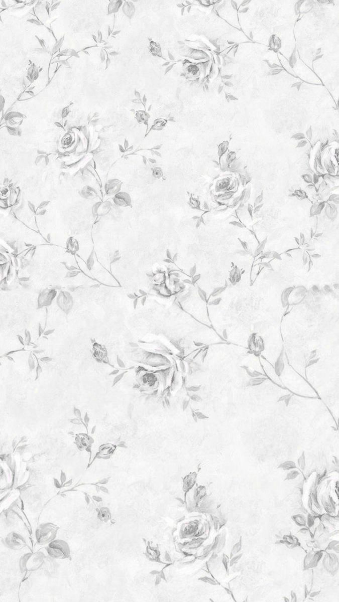 a white and grey wallpaper with roses on it