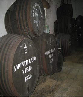 several wine barrels stacked on top of each other