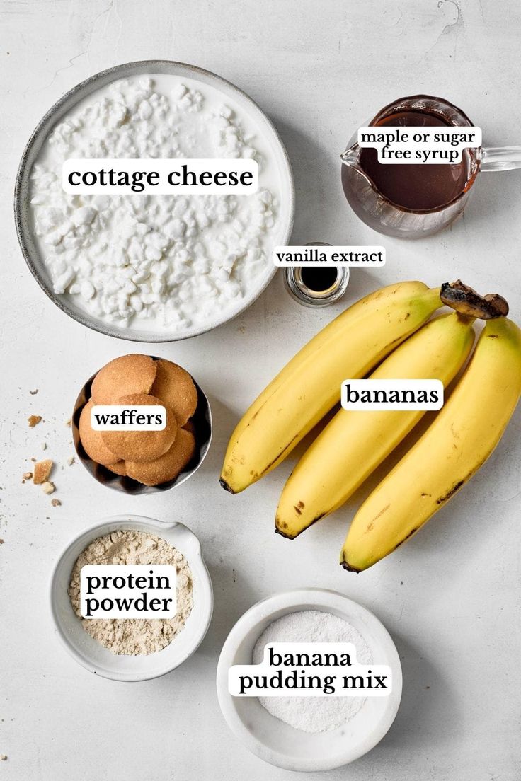 bananas, cottage cheese, and other ingredients on a white counter top with the words banana pudding mix