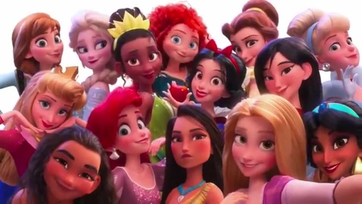 a group of disney princesses standing next to each other