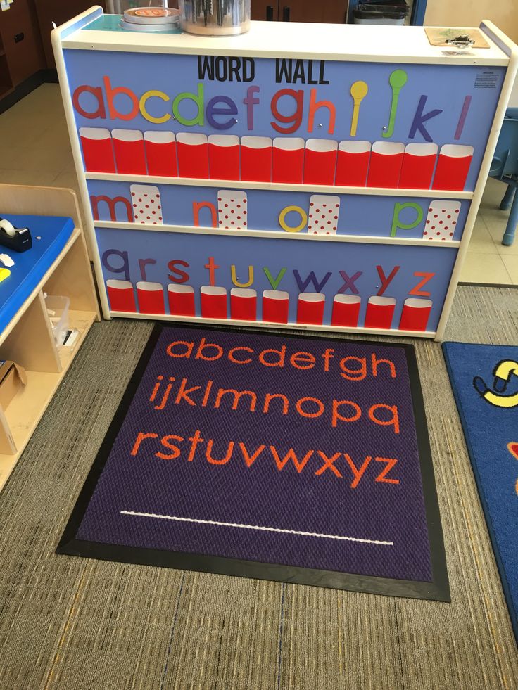 an alphabet and numbers display in a children's room