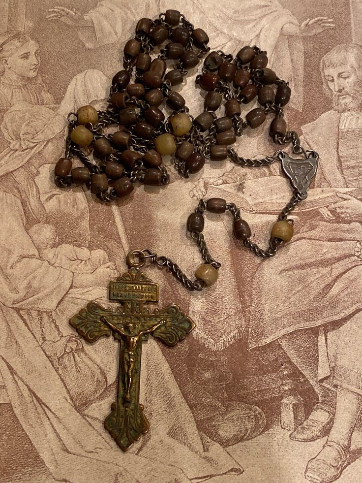 the rosary is next to an image of jesus