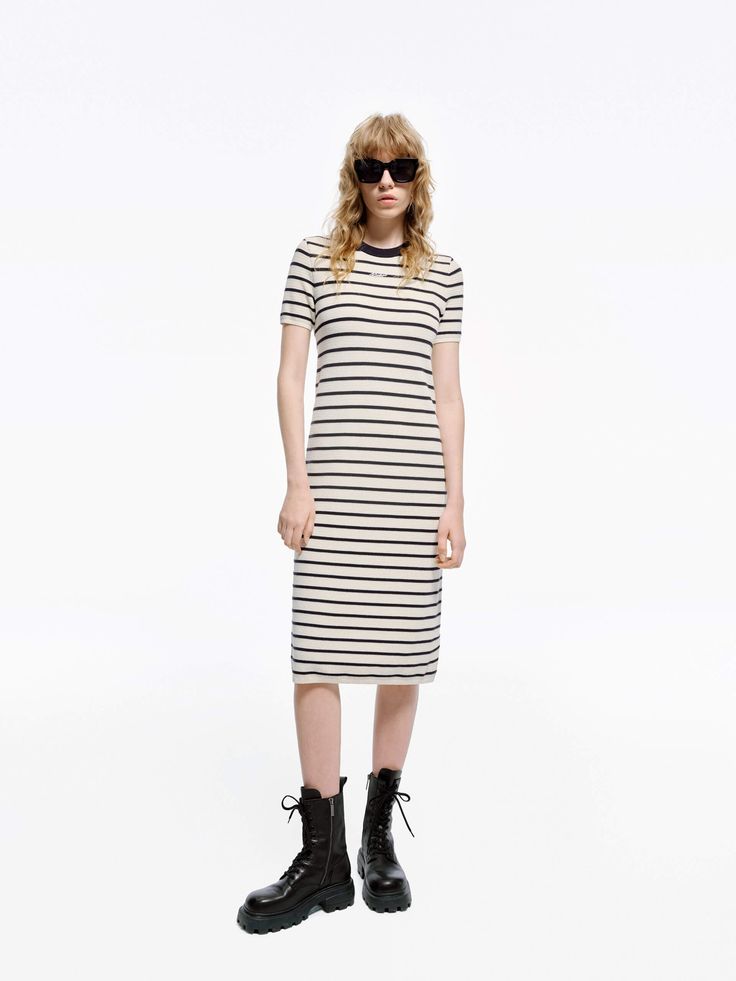 MO&Co. Women's Round Neck Striped Dress Crafted with a blend of wool and fabric, this mid-length T-shirt dress boasts a modern silhouette and stylish striped design. Perfectly pair with short boots for a minimalist, fashion-forward look. Features : - Midi T-shirt dress silhouette- Classic black and white stripes- Round neck, short sleeves Code: MBD1DRS038The back length of size S is 104cmMATERIALS & CARE Material: 67.7% Wool 32.3% PolyesterWrap metal parts before dry cleaning.REMINDER: All items Dress Crafts, Dress Silhouette, Color Stripes, Short Boots, Stripes Design, Striped Dress, Minimalist Fashion, Mid Length, T Shirt Dress