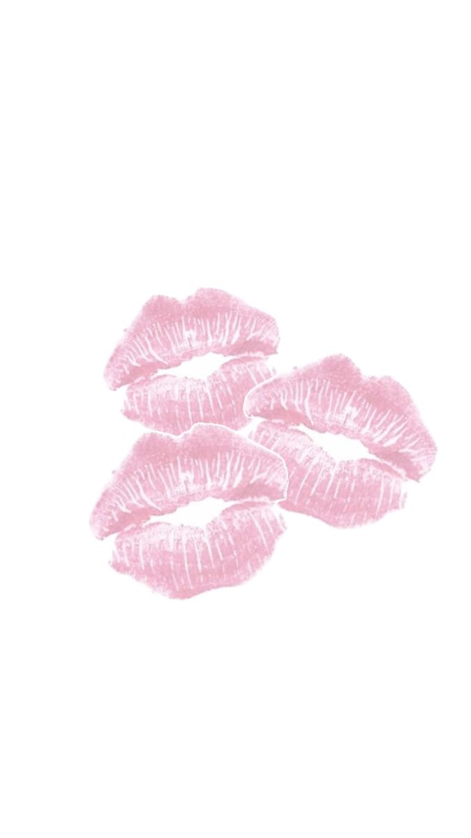 four pink lipstick kisses on a white background