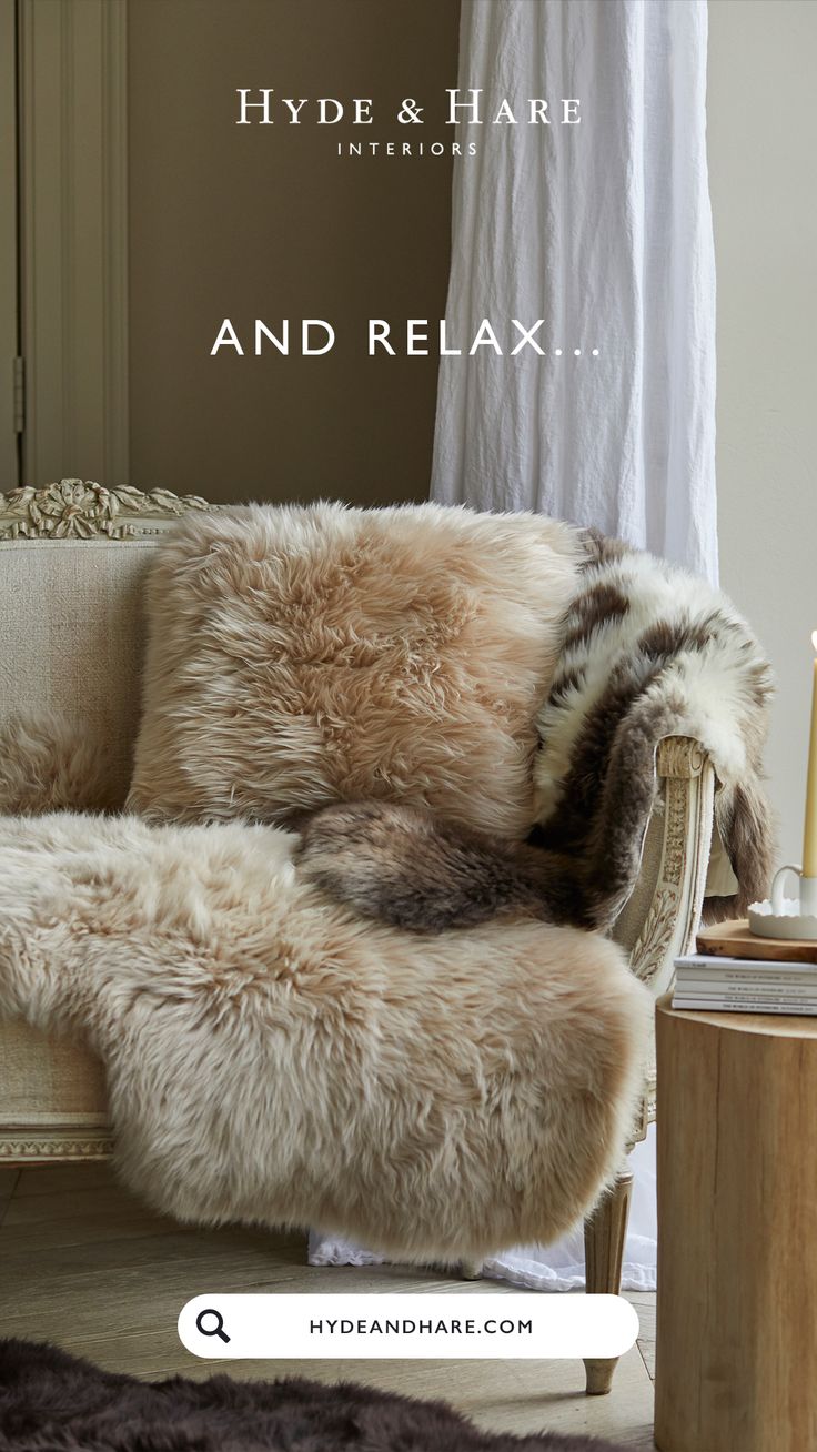 a chair with fur on it and the words hydde & habe