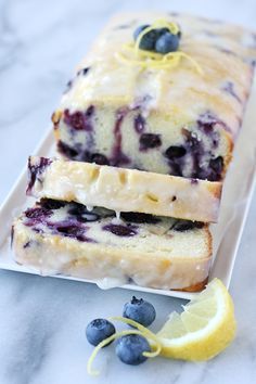 two slices of lemon blueberry bread on a plate