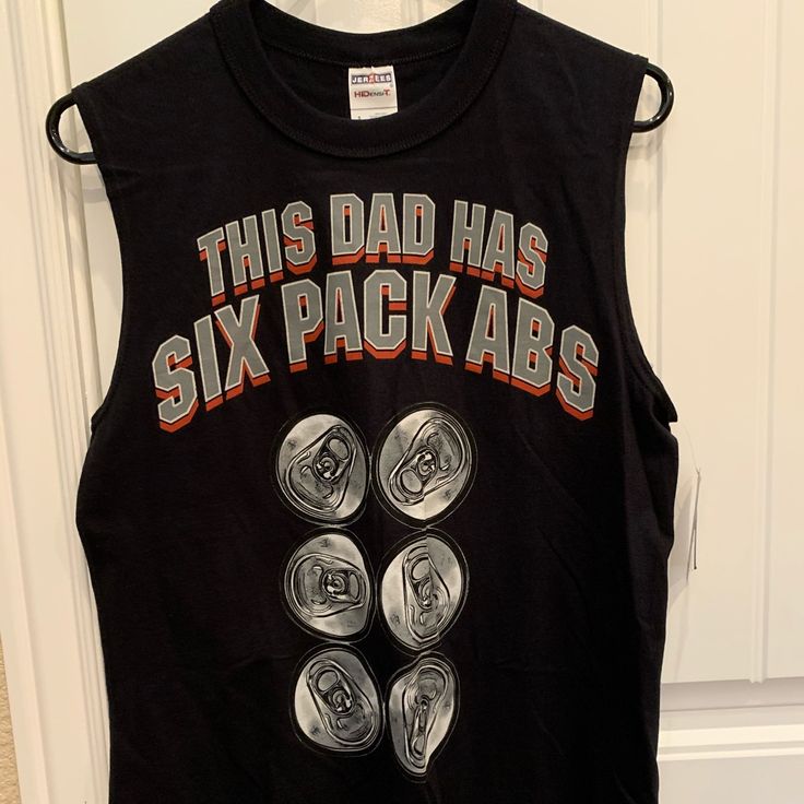 This Dad Has Six Pack Abs T-Shirt (Nwt) Sz S (34-36, Color Is Black. Casual Sleeveless T-shirt With Logo Print, Black Graphic Print Crew Neck Tank Top, Black Crew Neck Tank Top With Letter Print, Black Graphic Tee Tank Top With Letter Print, Black Sporty Muscle Tee With Letter Print, Casual Black Muscle Tee With Graphic Print, Casual Black Graphic Muscle Tee, Casual Black Graphic Print Muscle Tee, Black Sleeveless Graphic Tee