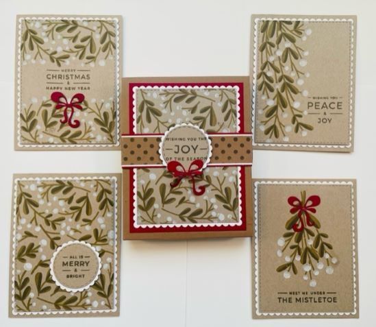 four christmas cards with bows on them